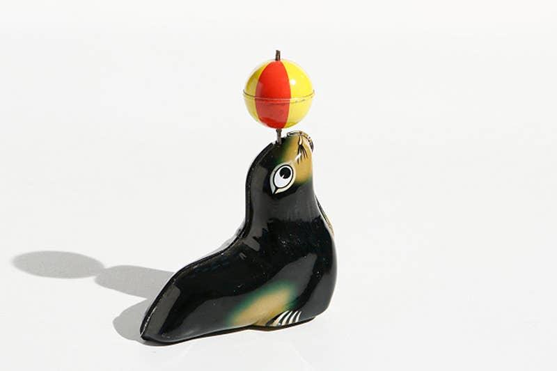 Black Tin Sea Lion Wind-Up - Antique & Hire