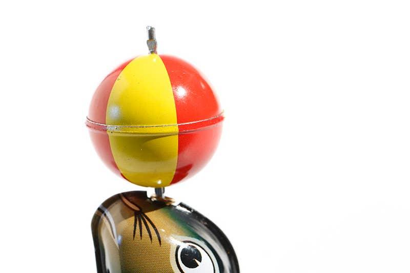 Black Tin Sea Lion Wind-Up - Antique & Hire