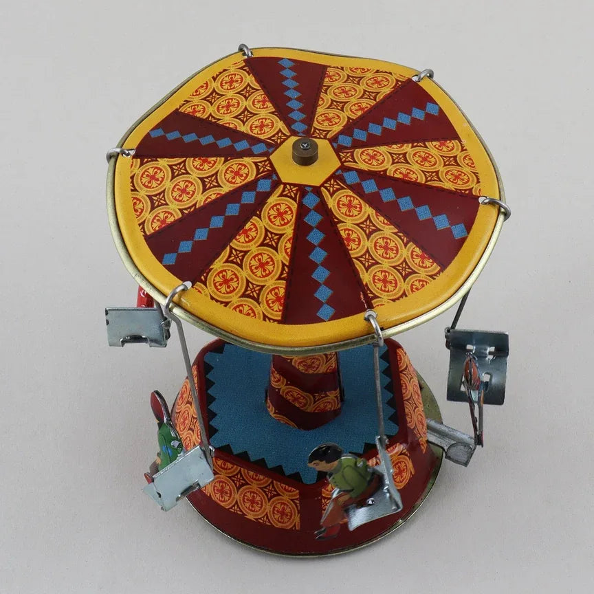 Tenekeden yapılmış oyuncak atlıkarınca salıncak panayır eski usul teneke oyuncak 01 Minyatür, el yapımı, dönen teneke atlıkarınca eski tasarımda.