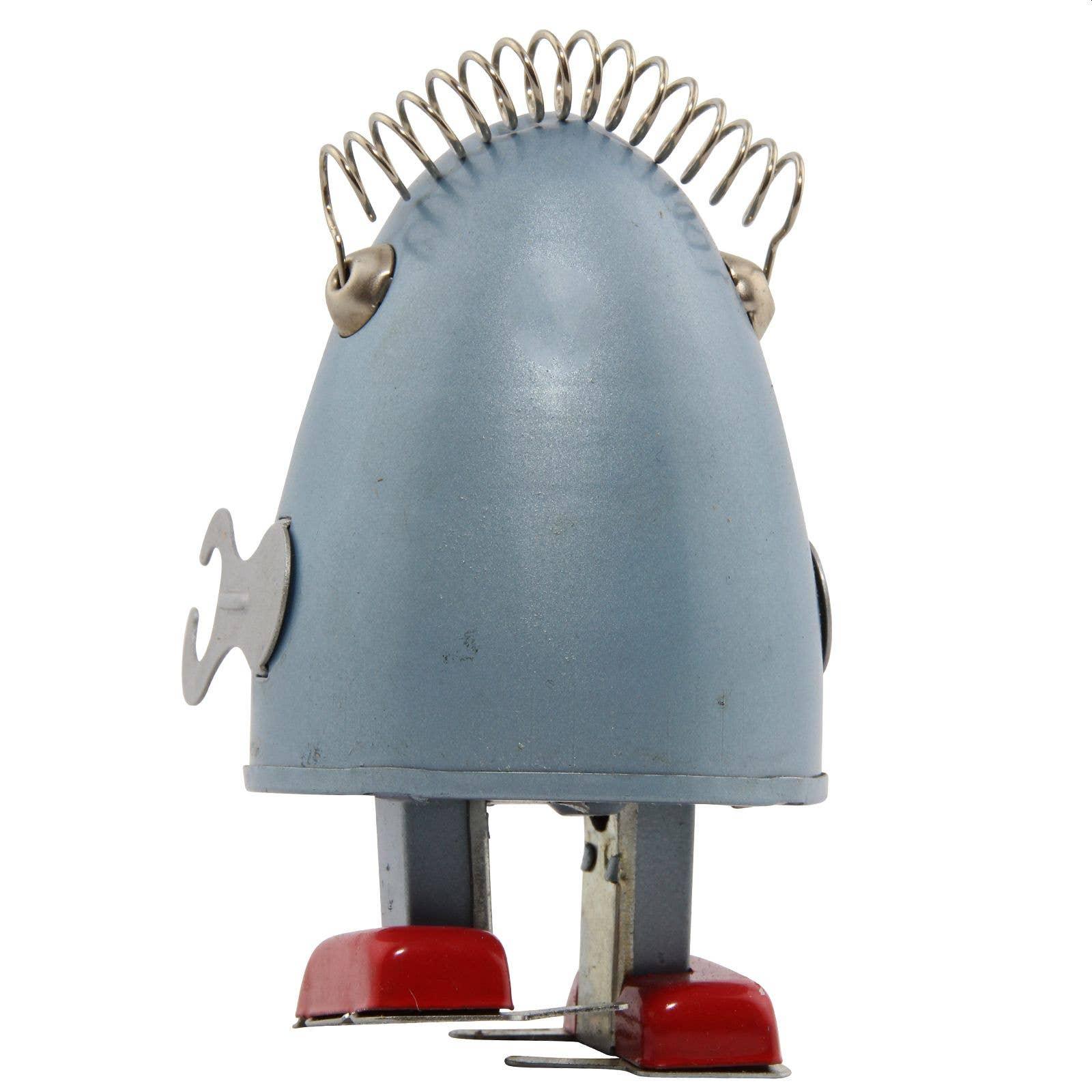 Huevo robot de hojalata plateado, juguete de cuerda con llave, pieza de colección en estilo retro nostálgico.