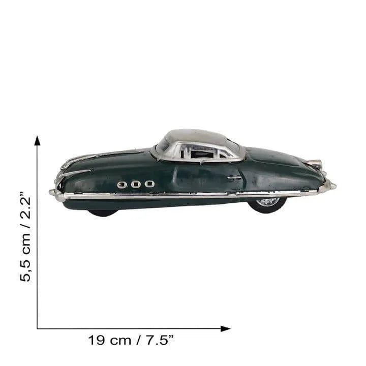 Klassisches Blechspielzeug aus den 50er Jahren: grüner Rennwagen mit Aufziehschlüssel, 19 cm lang, seitlich betrachtet.